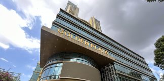 Vệ sinh kính toà nhà Golden Plaza TP Hồ Chí Minh